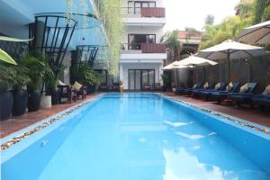 Bazén v ubytování Siem Reap Palace Hotel & Spa nebo v jeho okolí