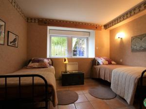Posteľ alebo postele v izbe v ubytovaní Gîte familial avec terrasse panoramique et cheminée, idéal pour randonnées près de Retournac - FR-1-582-355