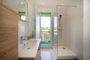 Kúpeľňa v ubytovaní Fully equipped apartment with parking 6 beds