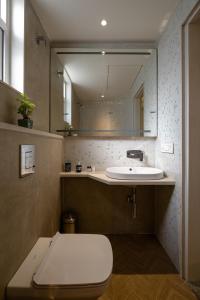 A bathroom at C'est La Vie Boutique Apartments by Le Pension Stays