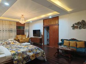 Voodi või voodid majutusasutuse Tasana Garden Saraphi ทาซาน่าการ์เด้น สาขาสารภี toas