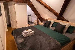 Postel nebo postele na pokoji v ubytování MOREHOME-Apartments Oldtown Flair