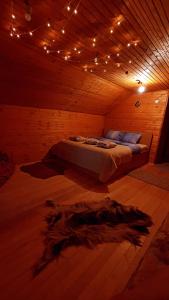 Giường trong phòng chung tại Mysterylodge Bjelašnica Treskavica