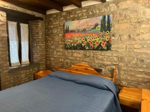 A bed or beds in a room at La Baita da Nino