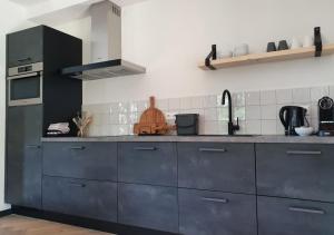 Η κουζίνα ή μικρή κουζίνα στο Nest Lodge