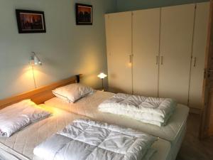 A bed or beds in a room at Vibereden