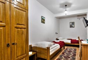 Letto o letti in una camera di Hotel Kandilj