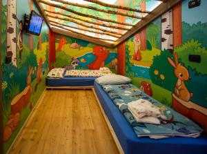 Postel nebo postele na pokoji v ubytování Hotel Touring
