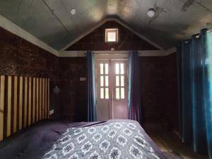 The Dandelion - Colonels Jungle Resort客房内的一张或多张床位