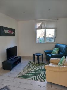 Posezení v ubytování Petit chalet en bois
