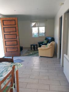 Posezení v ubytování Petit chalet en bois