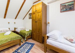 Letto o letti in una camera di Hotel Kandilj