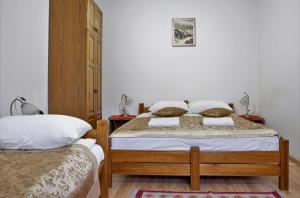 Letto o letti in una camera di Hotel Kandilj