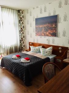 Łóżko lub łóżka w pokoju w obiekcie Landgasthof ht1