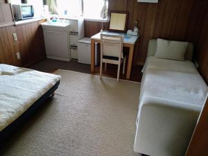 民宿ザーバルにあるベッド