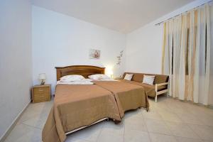Postel nebo postele na pokoji v ubytování Villa Vesna