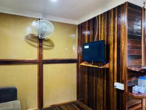 TV a/nebo společenská místnost v ubytování MOSS HEDERA HIDE CHALET