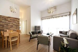 Posezení v ubytování perfect location 3 bedrooms + 13 fotografií