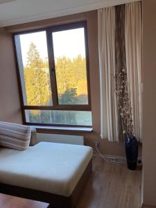 Postel nebo postele na pokoji v ubytování Апартамент за гости Свети Трифон