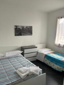 Ένα ή περισσότερα κρεβάτια σε δωμάτιο στο Villaggio Turistico da Tonino +95 φωτογραφίες