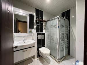 Koupelna v ubytování Grand Ezel Hotel