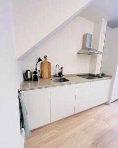 Kuchyňa alebo kuchynka v ubytovaní Brandnew beachfront appartment