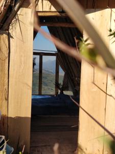 an open door to a room with a view at Imani Eco Sky Lodge Ngoc Chien in Nam San