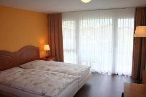 Letto o letti in una camera di Welcome Hotel Täsch by Täscherhof