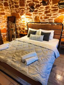Postel nebo postele na pokoji v ubytování Vila Apostolis