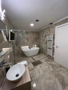 Kúpeľňa v ubytovaní Luxury 1 al Duomo di Parma