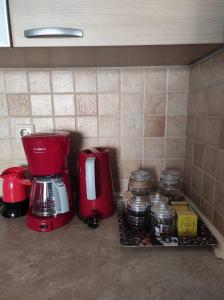 A kitchen or kitchenette at Ρετιρέ με θέα