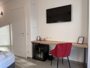 TV a/nebo společenská místnost v ubytování B&B NALÙ