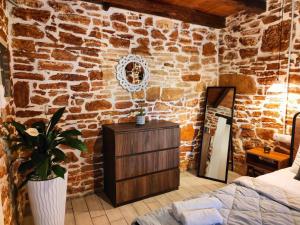 Postel nebo postele na pokoji v ubytování Vila Apostolis