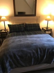 The West Highland Way Hotel Accommodation客房内的一张或多张床位
