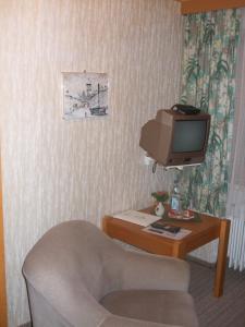 TV a/nebo společenská místnost v ubytování Gasthof Sölln