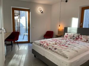 Postel nebo postele na pokoji v ubytování B&B NALÙ