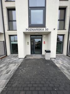 Η πρόσοψη ή η είσοδος του Apartament Poznańska +3 φωτογραφίες