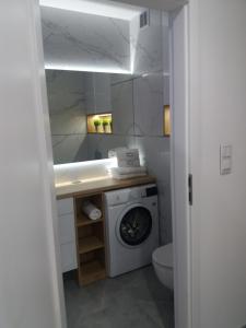 Kúpeľňa v ubytovaní Apartament Przystań z tarasem