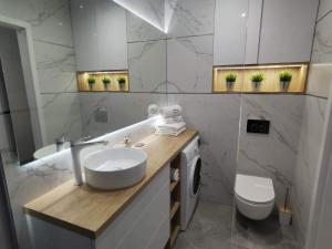 Kúpeľňa v ubytovaní Apartament Przystań z tarasem