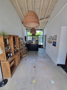 a large room with a hallway with a large ceiling at Posada Las Chacras in Ciudad Lujan de Cuyo