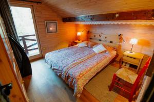 Postel nebo postele na pokoji v ubytování Chalet Alpinka