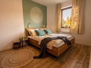Posteľ alebo postele v izbe v ubytovaní Apartament Sielanka Jaworki + 25 fotografií