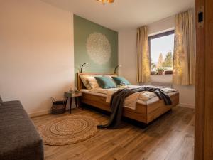 Posteľ alebo postele v izbe v ubytovaní Apartament Sielanka Jaworki