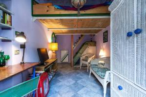 A bed or beds in a room at B&B GauTama