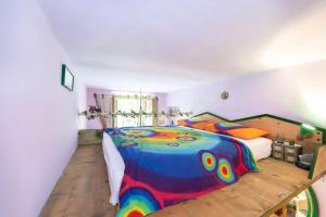 A bed or beds in a room at B&B GauTama