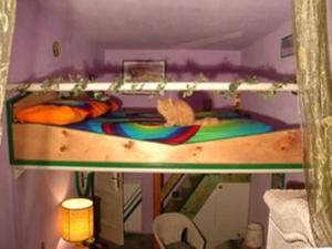 A bed or beds in a room at B&B GauTama