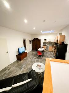 TV/Unterhaltungsangebot in der Unterkunft Downtown Apartments Theatre