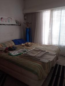 Giường trong phòng chung tại Casa Alvear