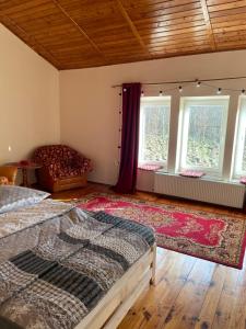 Łóżko lub łóżka w pokoju w obiekcie Willa Toskania