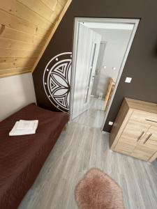 Łóżko lub łóżka w pokoju w obiekcie Domek Góralski Kąty na Wierchu